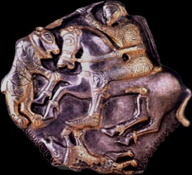 Horseman with knemida attacking animals. The Letnitsa Treasure