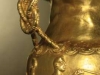 Handle-detail from golden jug